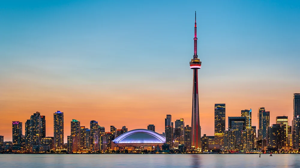 Toronto city skyline with the lake in the foreground.